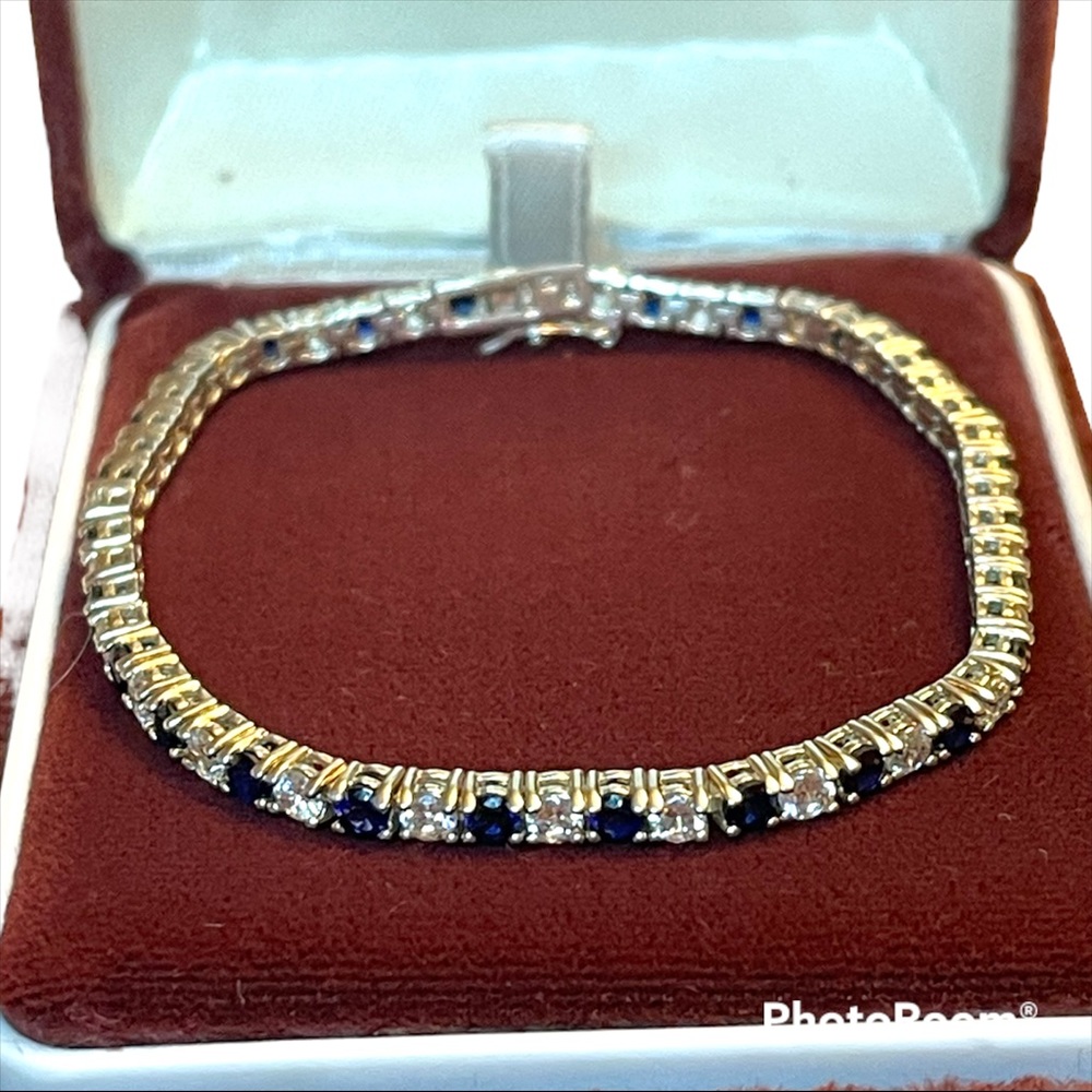 - Ross-Simons Sapphire & CZ Tennis Sterling Silver Bracelet 7”